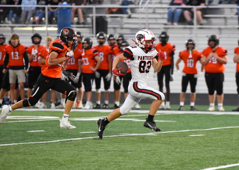 Creston wide receiver Brandon Briley breaks away from the Tigers defenders for a 57-yard touchdown pass on the first play from scrimmage in a drive at the end of the first quarter. Briley logged five receptions for 123 yards and two touchdowns.