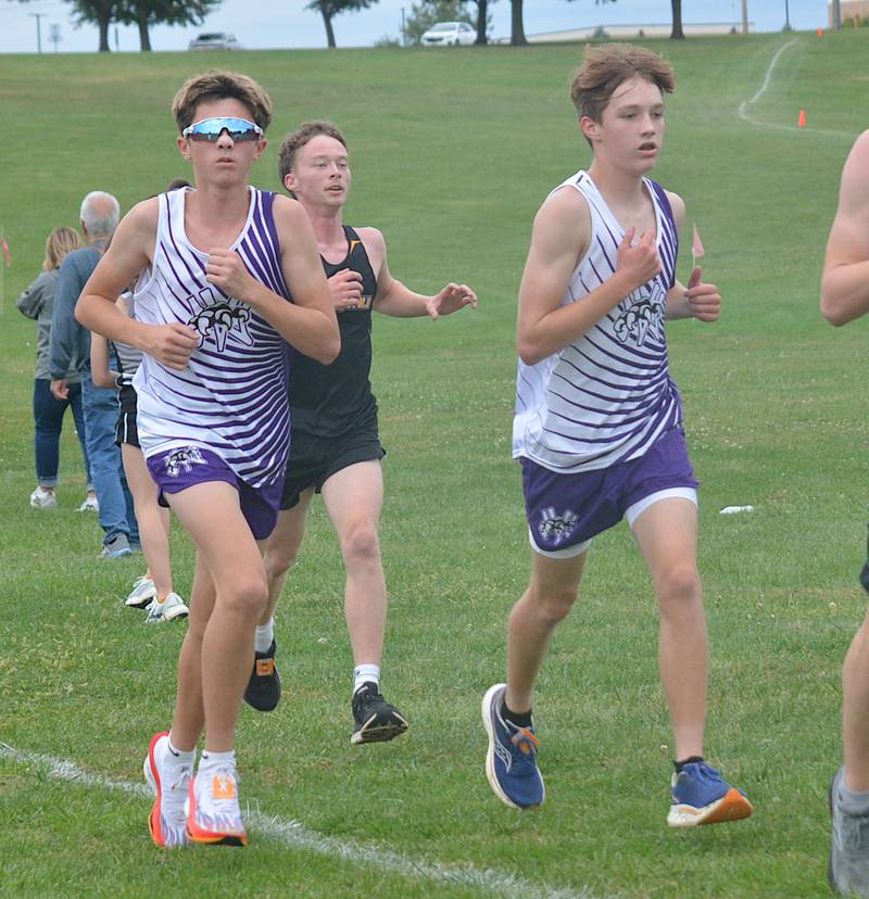 Wolverine runners Trevyn Colton and Everett Euler during the Creston Panther Invitational.