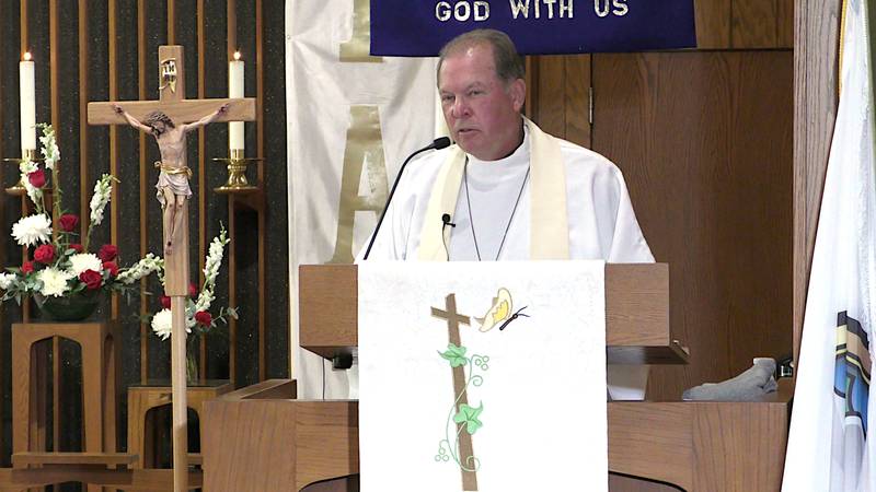 Rev. Tom Queck, the grandson of former pastor Dr. George Vogel, gives the sermon at Immanuel Lutheran Church's 150th anniversary service.