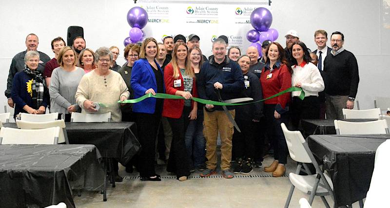 Greenfield Chamber Main Street and Development officials, other community leaders and Adair County Health System officials cut the ribbon on ACHS's new EMS House, rebuilt after the tornado.