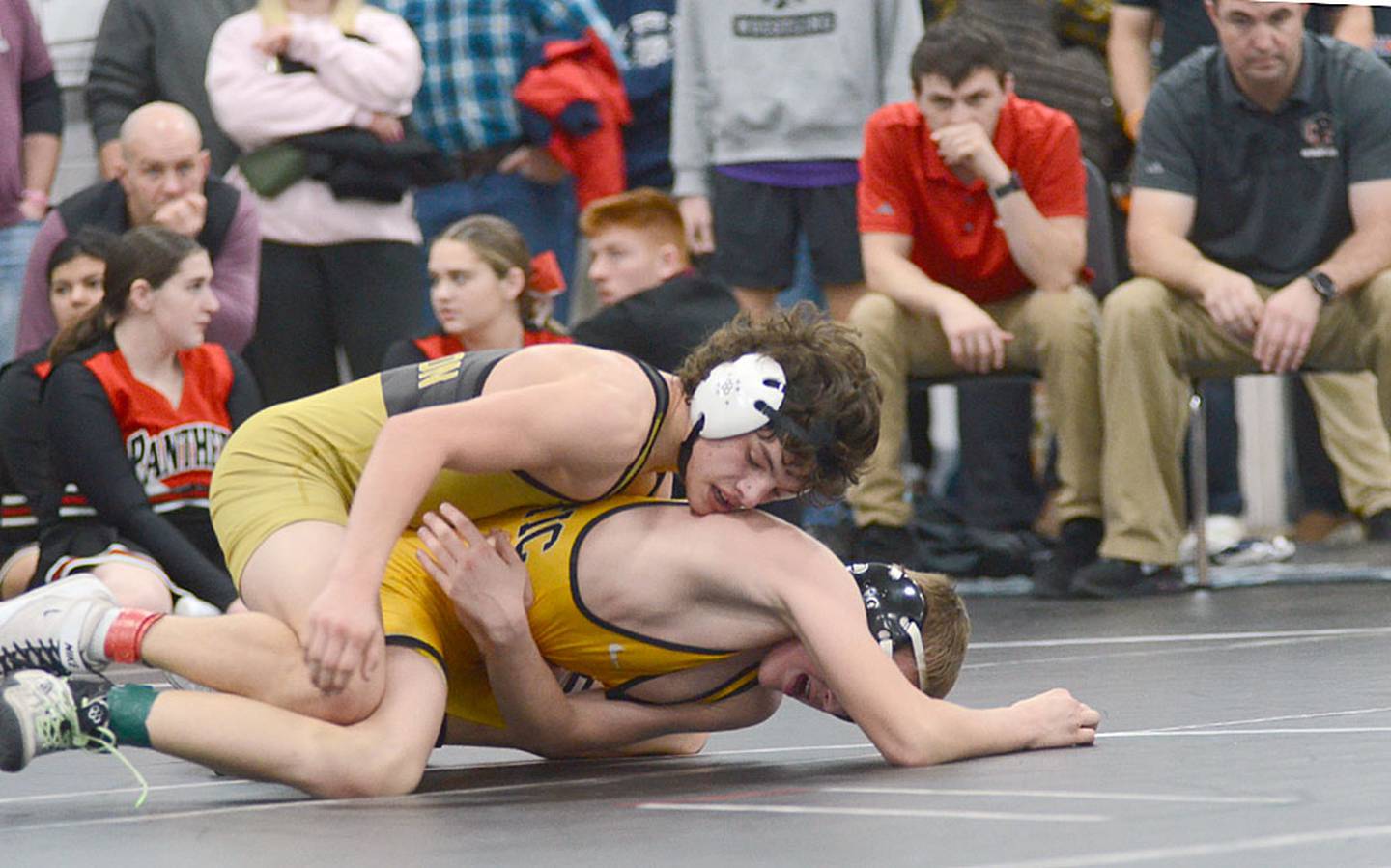 Ben James of Creston works from the top position against Atlantic's Collin Harris in the 113-pound championship match. Harris won a 9-0 major decision after James won by two pins and a 7-1 decision on his way to the finals.