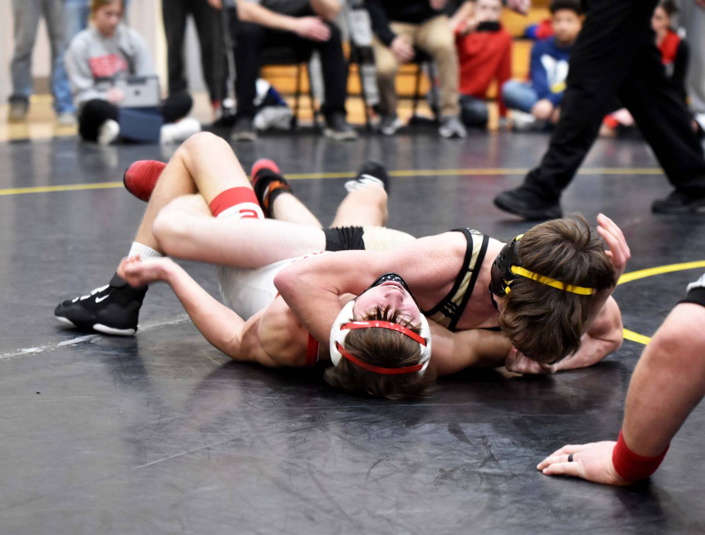 Christian Ahrens pins Gavyn Winters of Greene County in the 120 finals. Ahrens won the weight class.