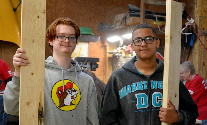 Levi Hall (left) and DJ Berry (right) were two of the students working in last weekend's Sleep in Heavenly Peace bed building session.