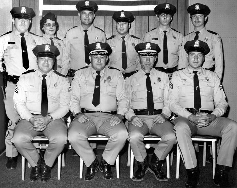 The Creston Police Department sometime in the 1970's. Pictured are, front, left to right: Bob McFee, Dean Jarman, Robert Kessler and Mike Duckworth; back row: George Khuns, Carolyn Barton, Richard Teply, Marion Manley, Lonnie Novy and Bill Heatherington.
