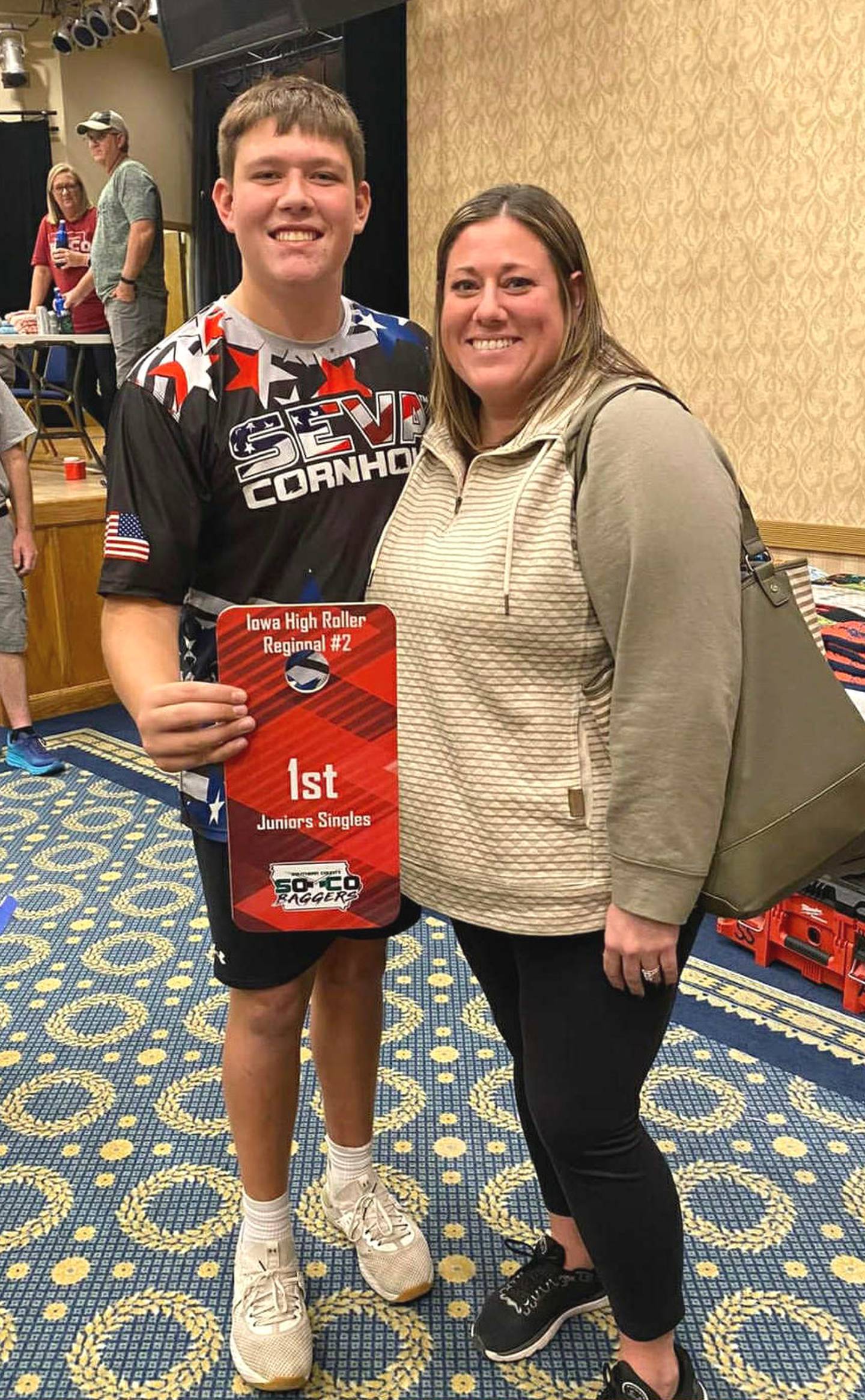 Dylan Graham with his mother Jentry Graham in November 2023 following the Iowa Cornhole League High Roller Regional competition.
