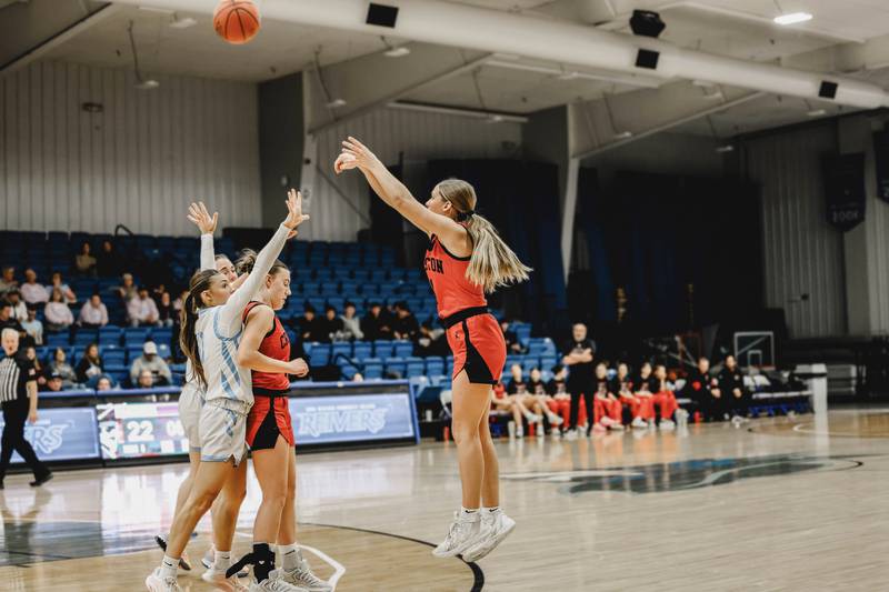 Kadley Bailey lets a shot go behind the arc Thursday at Lewis Central. She posted 33 points in the one-point win.
