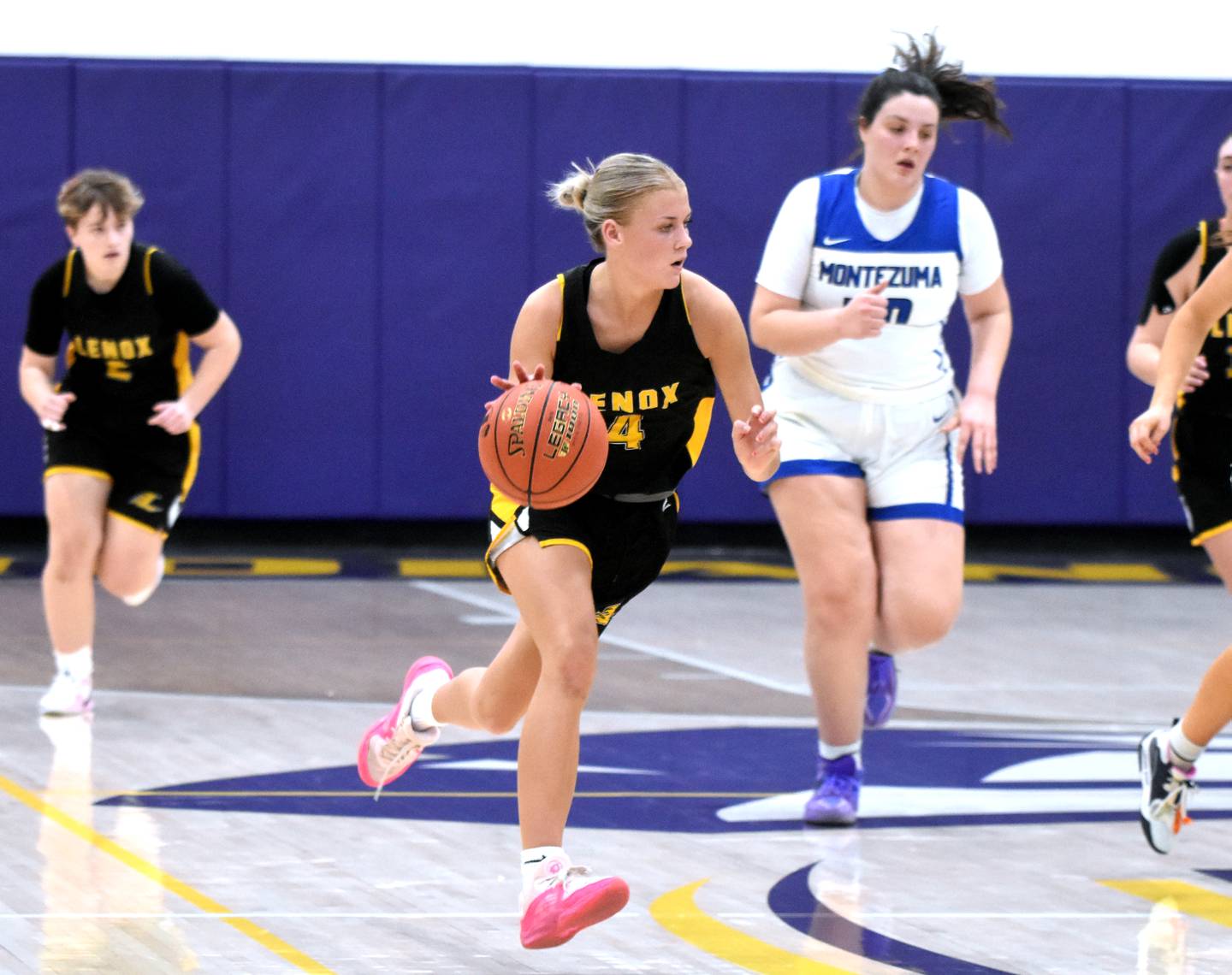 Senior Zoey Reed leads a Lenox fast break Wednesday against Montezuma. Reed finished with 11 points.