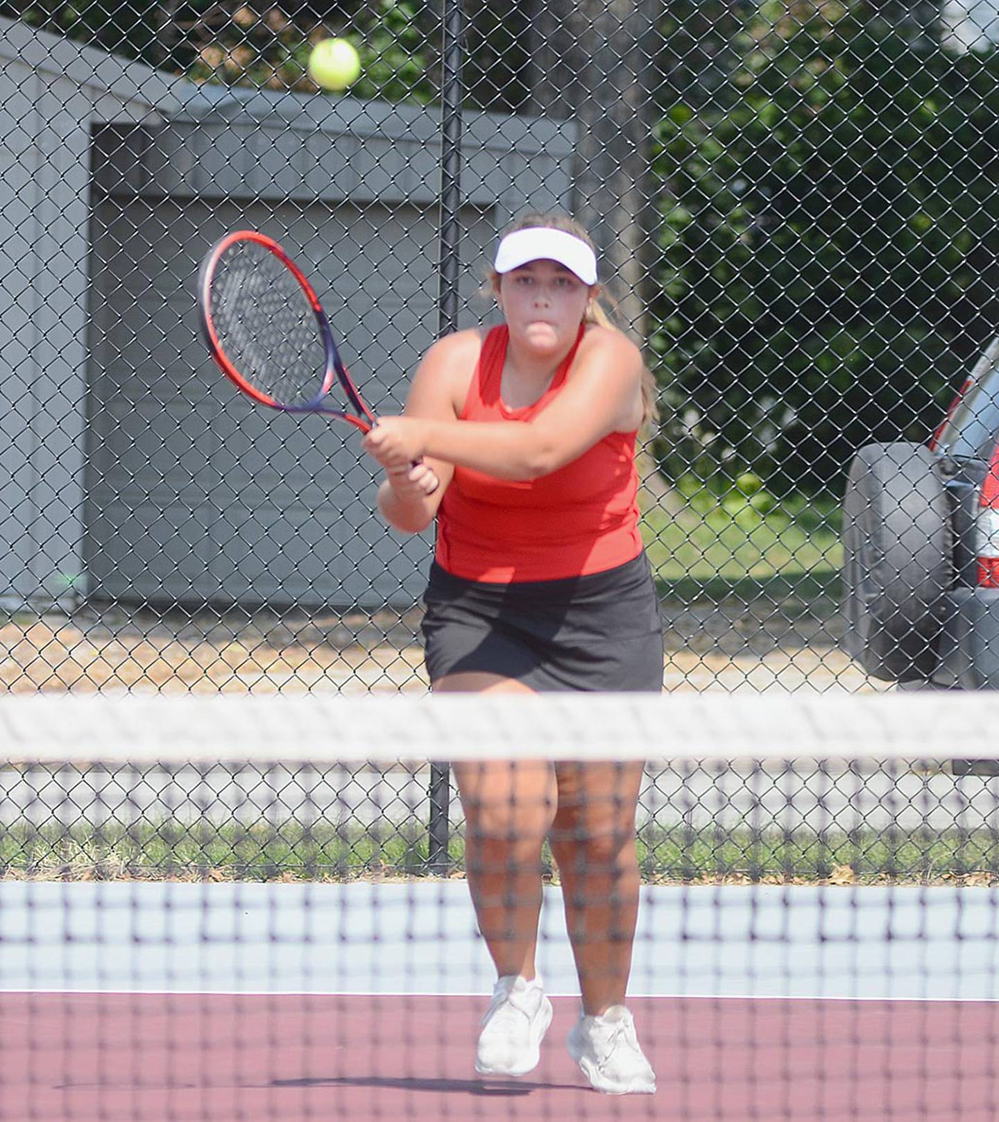 Creston's Shaylee Coen returns a shot during a No. 2 singles match at the Hawkeye Ten tournament.