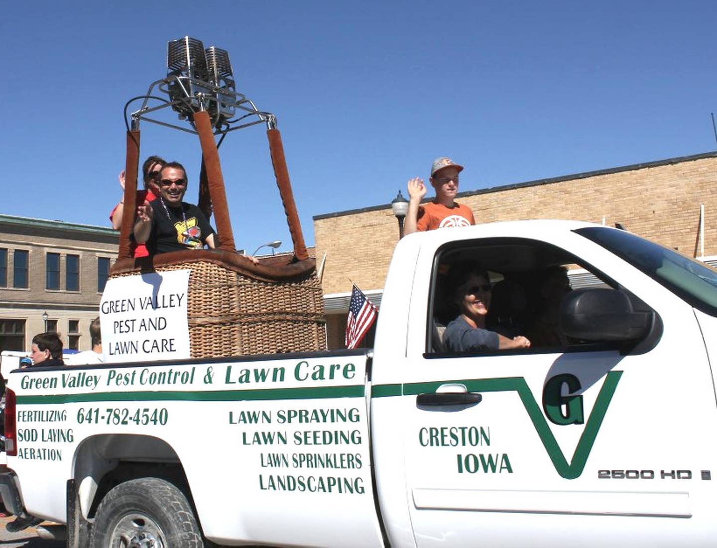 Dommer waves from his sponsors' truck during the annual Balloon Days parade.