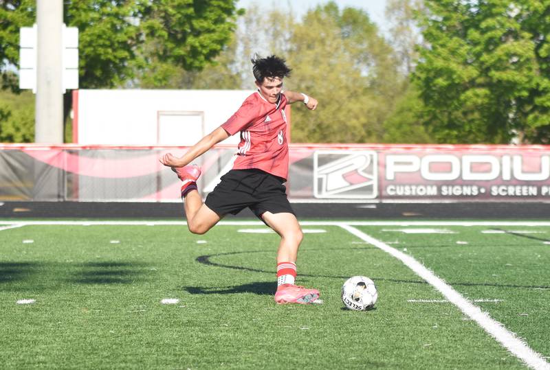 Creston’s Joaquin Flores winds up for a shot on goal Monday against Central Iowa United. Flores had three of the Panther’s four goals in the 4-3 win.