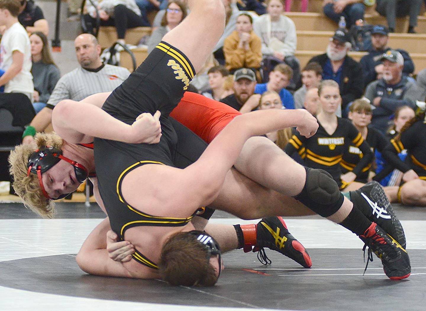 Gunner Martwick of Creston (top) looks to turn Seth Vanderlinden of Winterset during their third-place match at 215 pounds. Vanderlinden won by a fall in 5:20.