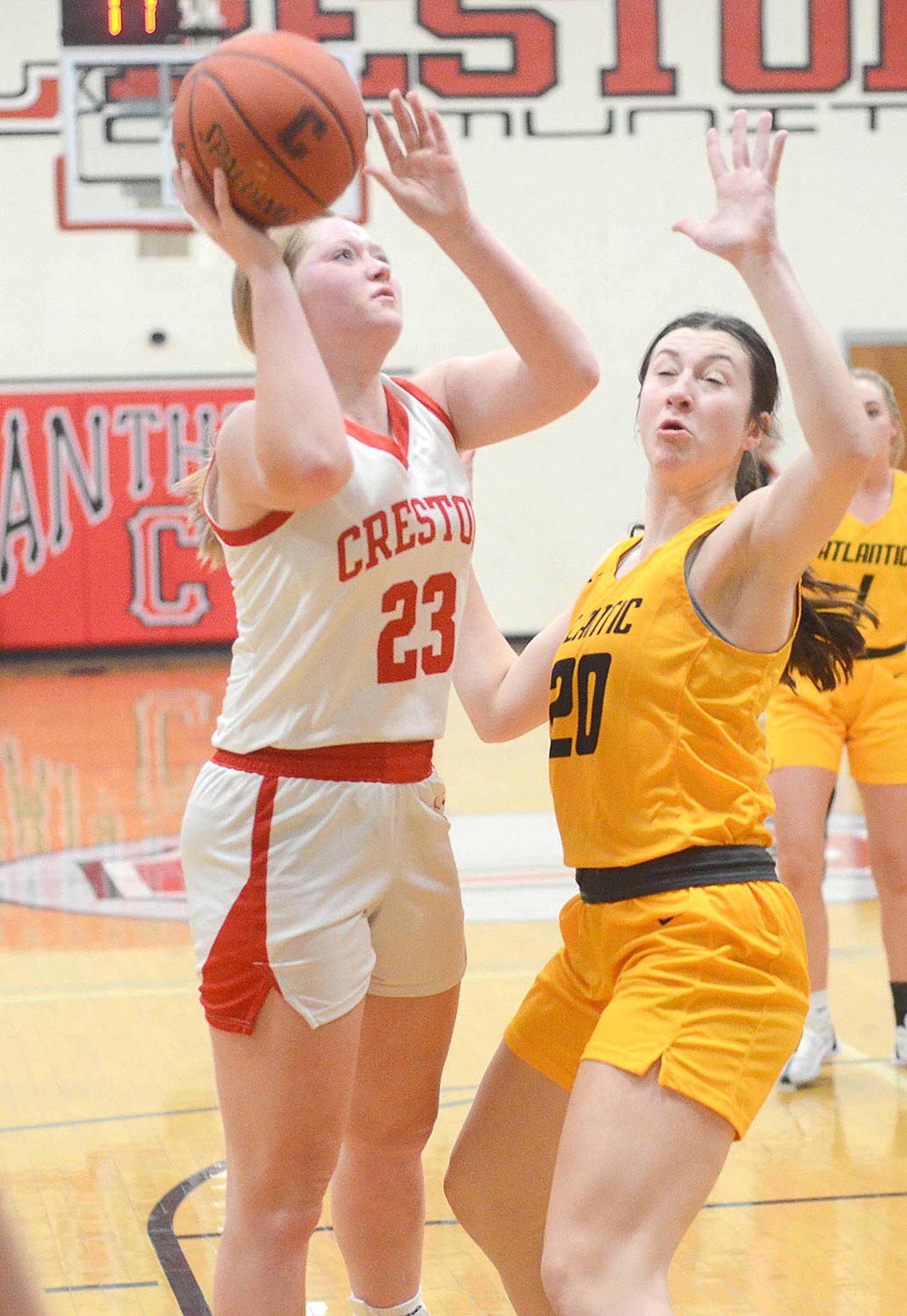Creston's Brynn Tussey shoots against Paytn Harter of Atlantic. Tussey had six points and seven rebounds in the 47-28.