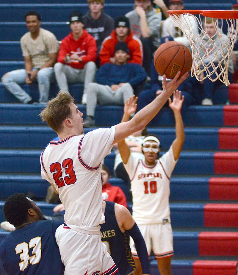 Southwestern guard Bogdan Cret drives to the basket against Iowa Lakes Saturday. Cret scored six points in the 60-59 win.