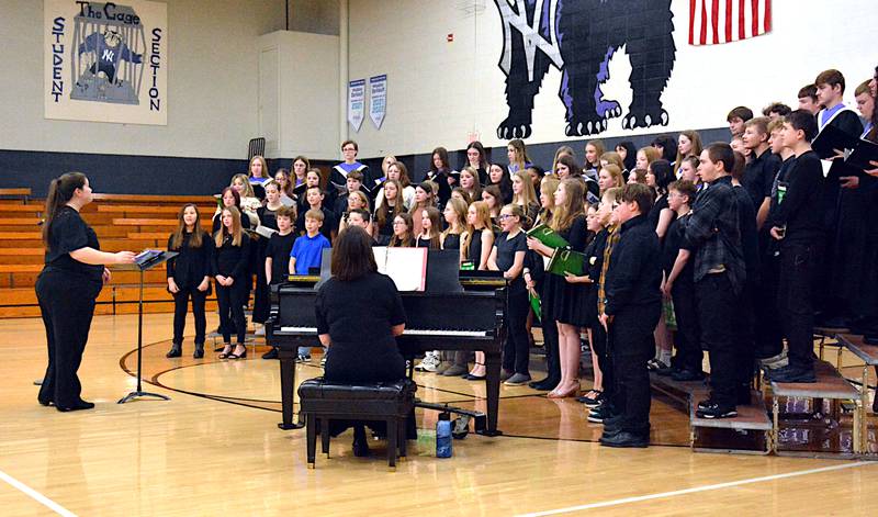 A combined choir of grades 6-12 perform a song from "The Greatest Showman" during the Festival of Choirs concert Thursday, March 6 in the Nodaway Valley High School gym, directed by Nicole Miller.
