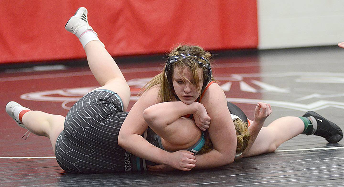 Creston 170-pounder Lydia Williams works for a fall against Southwest Valley's Akima Whipple. Williams placed third.