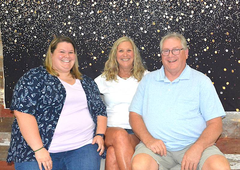 From left, Keri Meisenheimer, Lori and Scott Armstrong at a party for Lori Saturday, Aug. 30 at Sixteen Oaks. Lori has been a daycare provider for over 40 years. While Lori isn't retiring yet, Meisenheimer, who has been her assistant intermittently for years, and is a former daycare child, said this was a good chance to surprise her and congratulate her on all the lives she's touched.