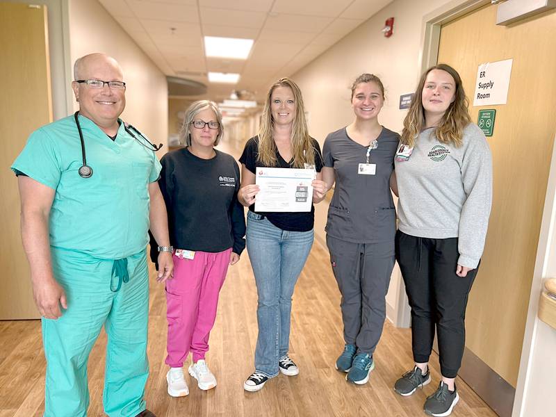Receiving an award for Adair County Health System for the facility's level of care of stroke patients are from left, Dr. Dean Moews, Lee Fry, Philicia Hancock, Haley Simmons and Amber Rinke.