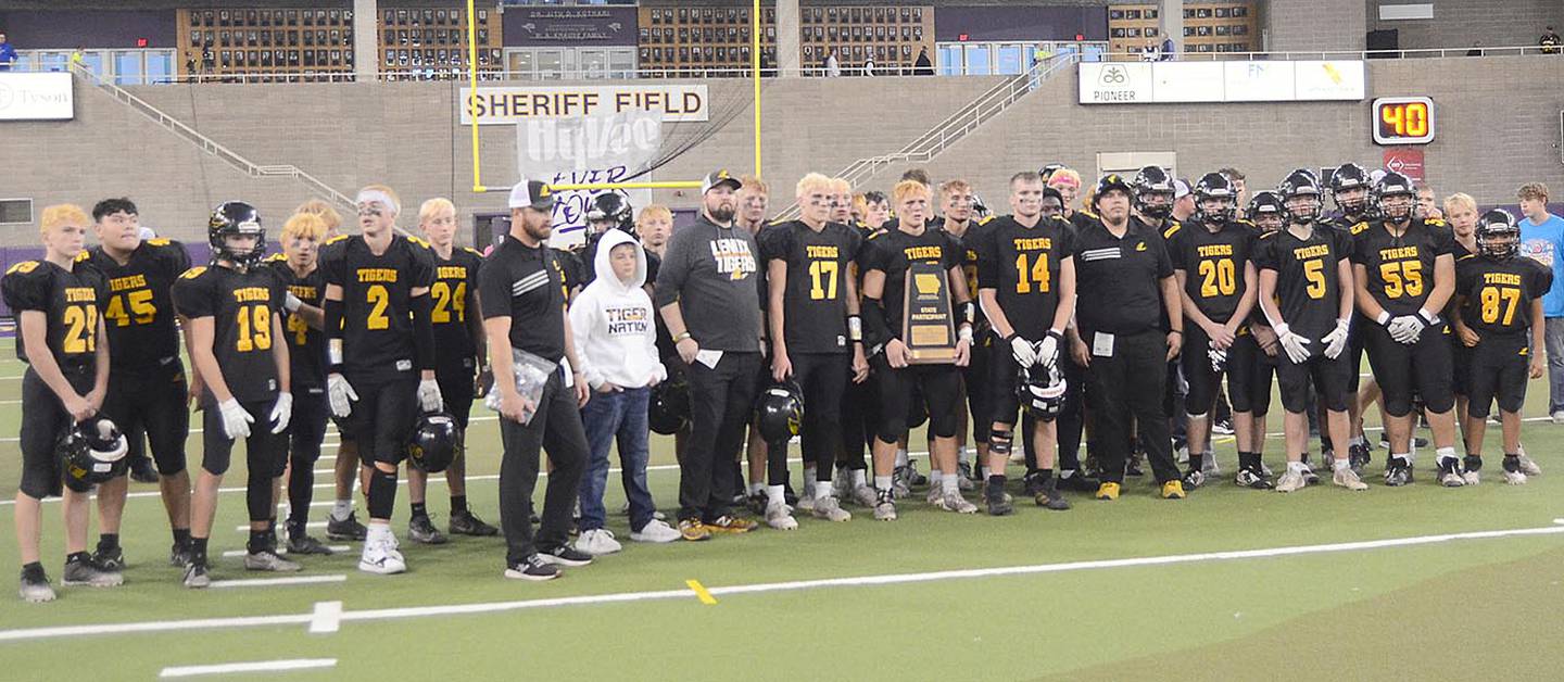 The Lenox football team is shown after Wednesday's trophy presentation at the UNI-Dome. The Tigers finished an 11-1 season in a 43-27 semifinal loss to Gladbrook-Reinbeck.