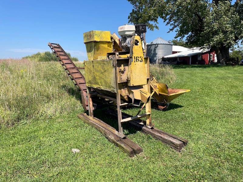 A walnut husking machine will allow Chase Green to collect walnuts property owners gather from their property and husk them down to edible walnuts and collect a profit. Green is one of few husking stations in Iowa.