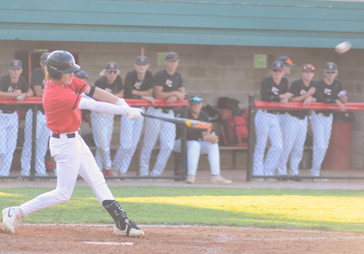 Creston freshman infielder Tanner Ray hits a single in the second inning of Monday's substate game at Harlan.