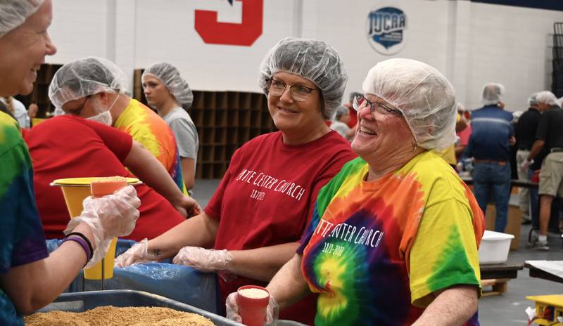 Members of the former Platte Center Church volunteer as one of 43 teams packing meals Wednesday.