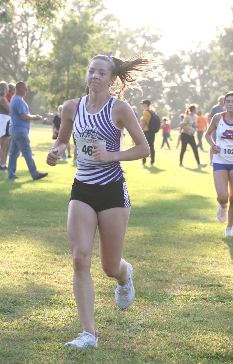 Wolverine freshman Abby Nelson runs in the Winterset cross country meet.
