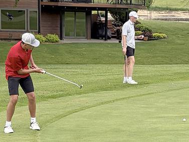 Spencer competes at district