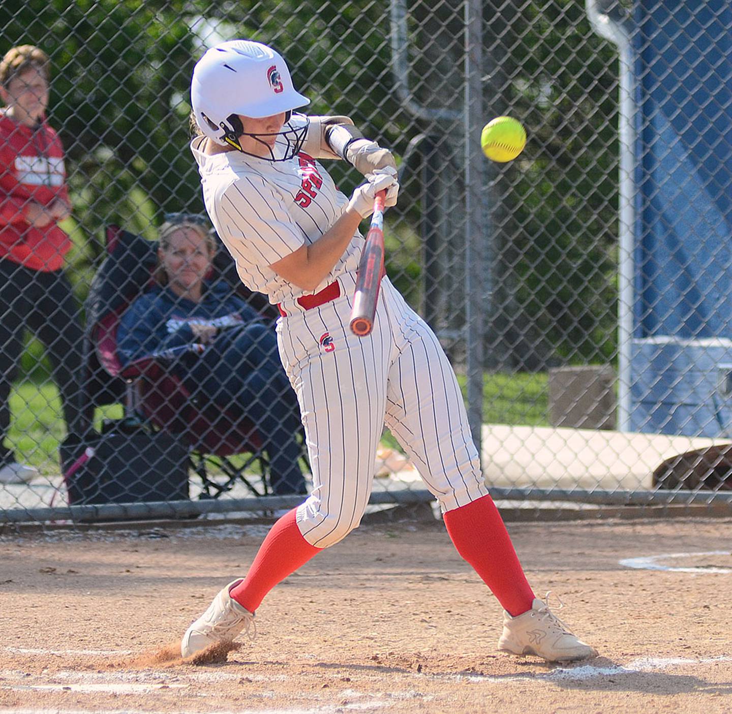 Southwestern first baseman Hannah Hackmann connects with a double to the right-center field gap against Iowa Western. It was Southwestern's only extra-base hit in the doubleheader.