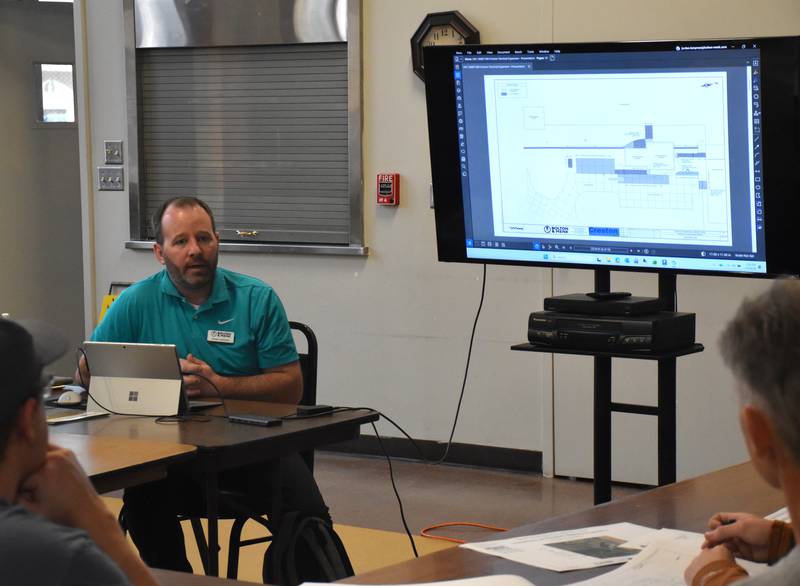 Jordan Lampman of Bolton & Menk provide updates to the Creston Airport Commission on the terminal project.