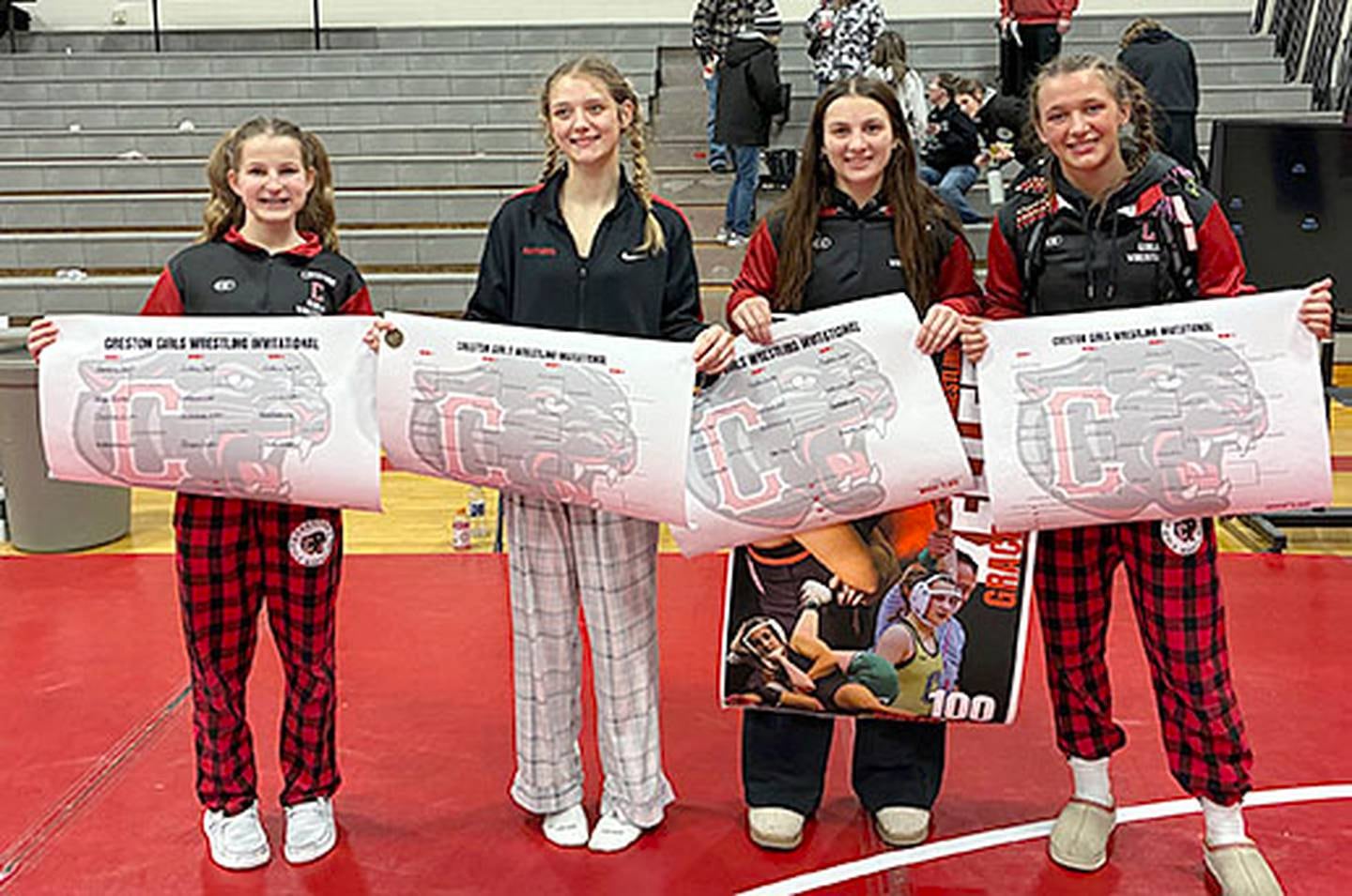 Creston's four individual champions in the Panther Invitational are, from left, Eva Chesnut (100 pounds), Sydney Hoffman (115), Grace Keeler (135) and Alainah Galanakis (130).