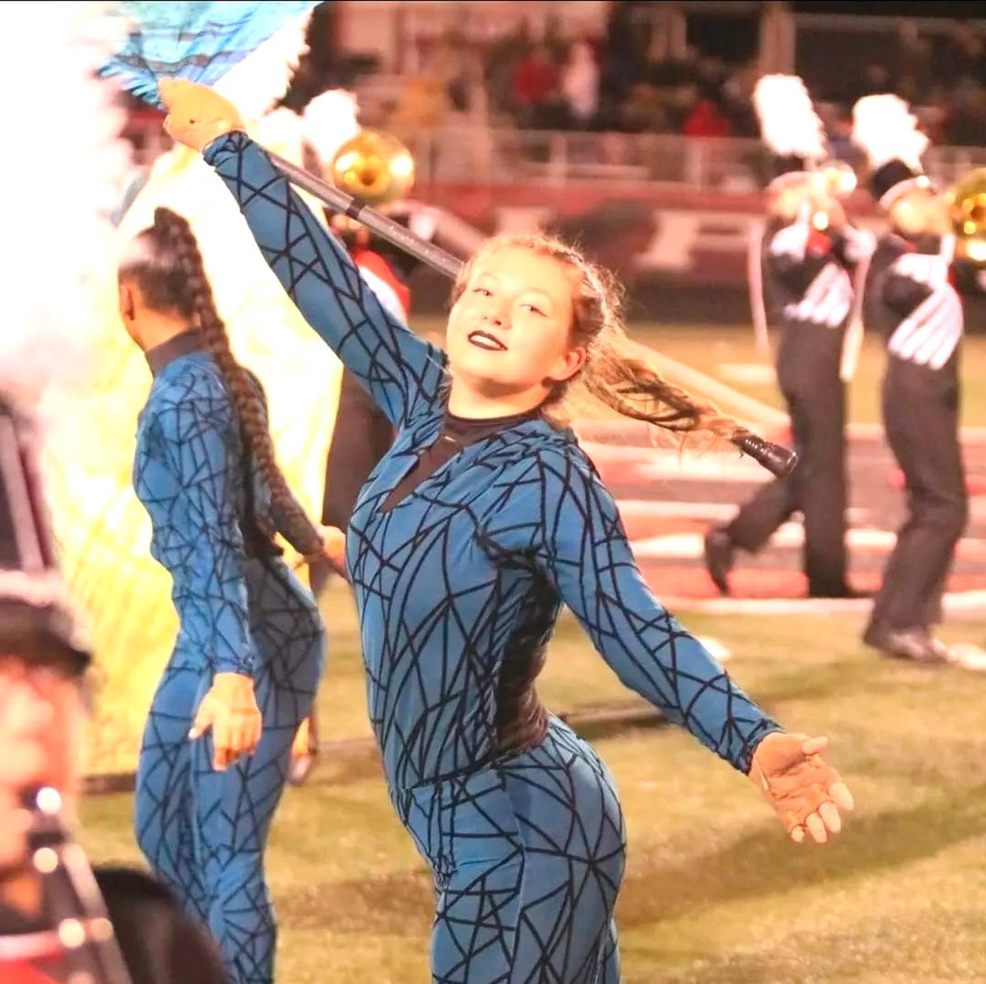 Collins performs during halftime at a Creston High School football game in 2023.