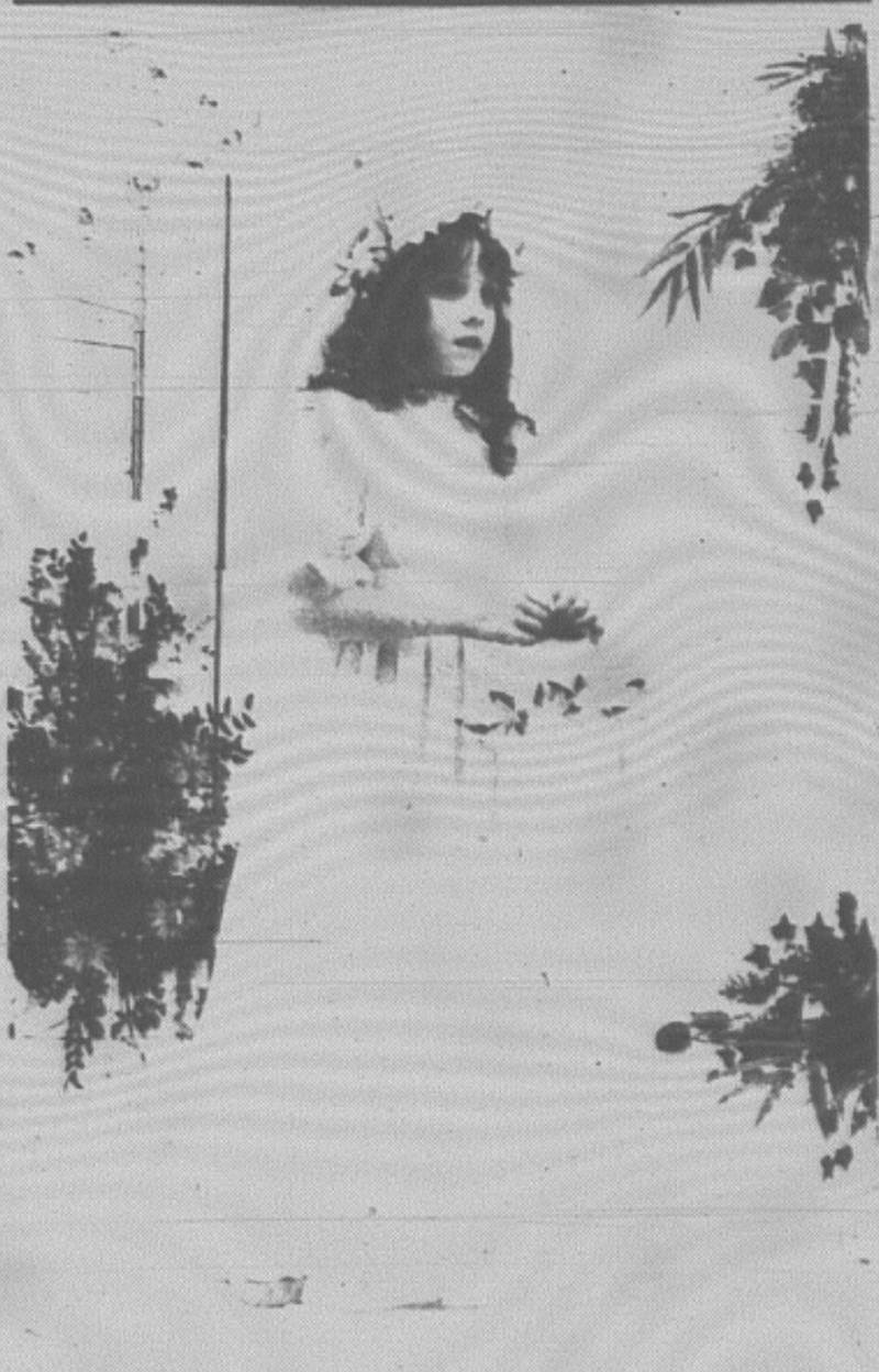 Emmy Lou Barnes models one of three flower girl dresses. Flowers were provided by Bonnie's Flowers & Gifts, Kelly's Flower Shop and the Creston Greenhouse.