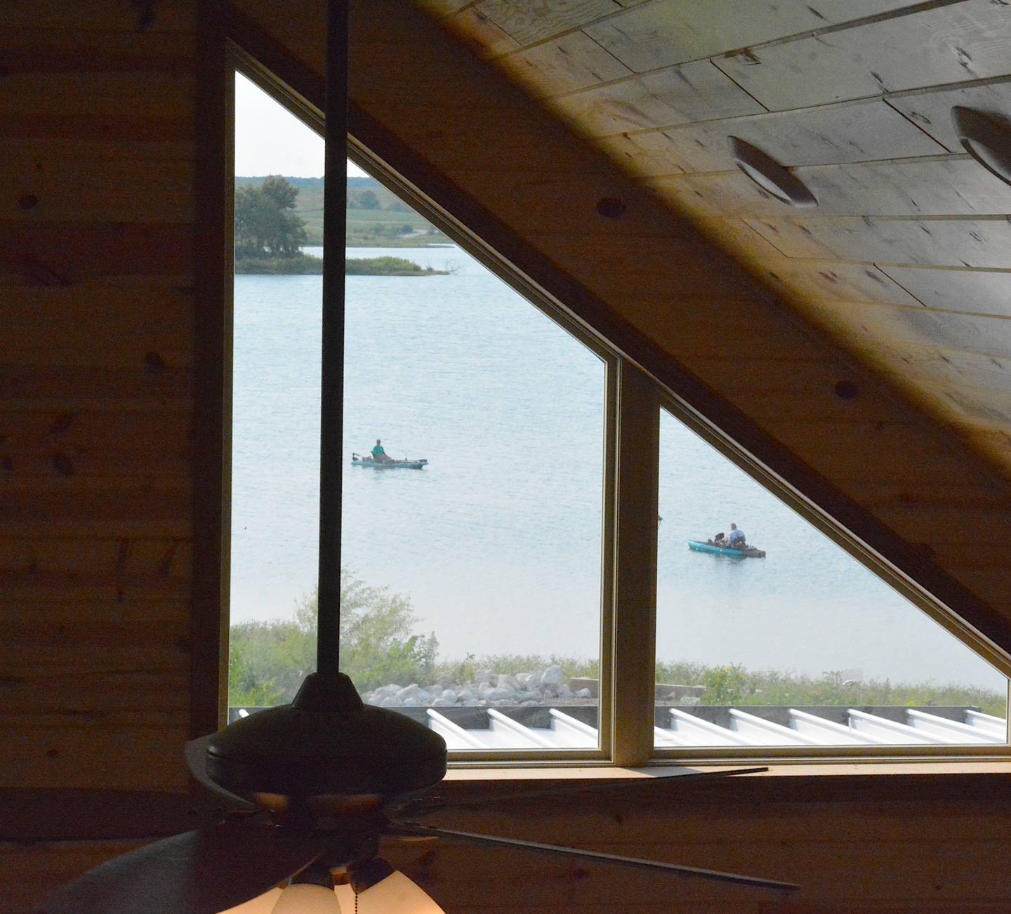 The view of the lake from the loft in Pintail Cabin. Proximity to the lake was a major priority in the cabin's construction.