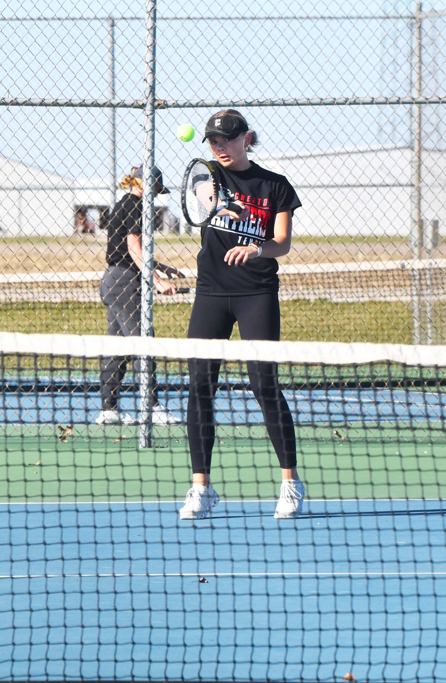 Ava Adamson lands a return shot in her 8-4 No. 2 singles victory over Jade Harter of Atlantic.