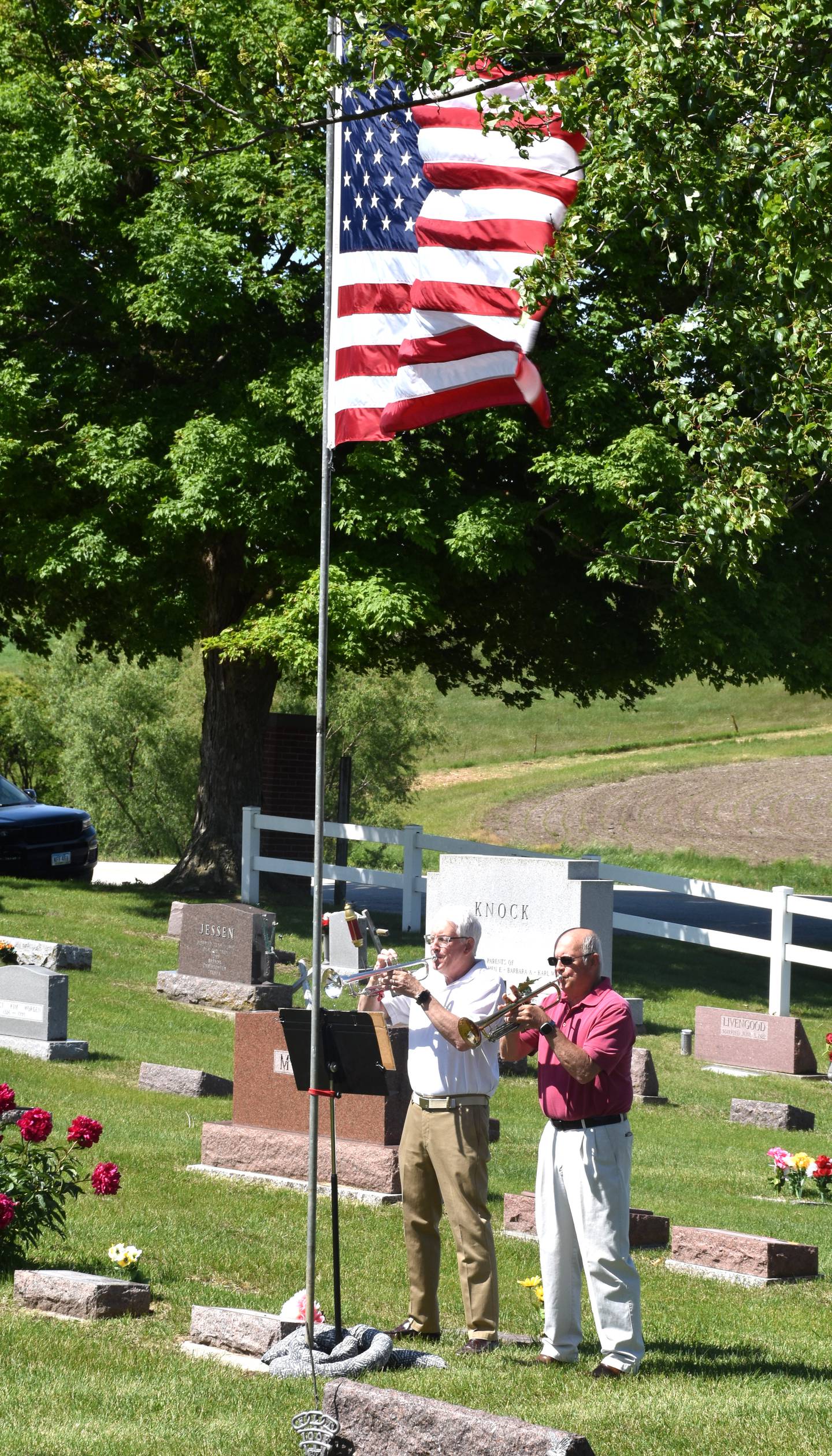 "The Star-Spangled Banner" and taps are played during the Memorial Day service Monday.