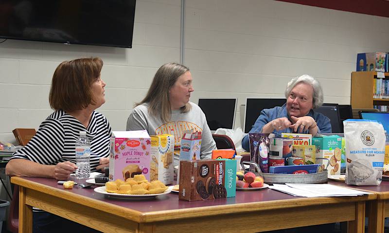 From left, Terri Tussey, Jen Frederick and Kathy Fiala present Saturday morning on their favorite gluten free tips, tricks and products at the Orient Community Library.