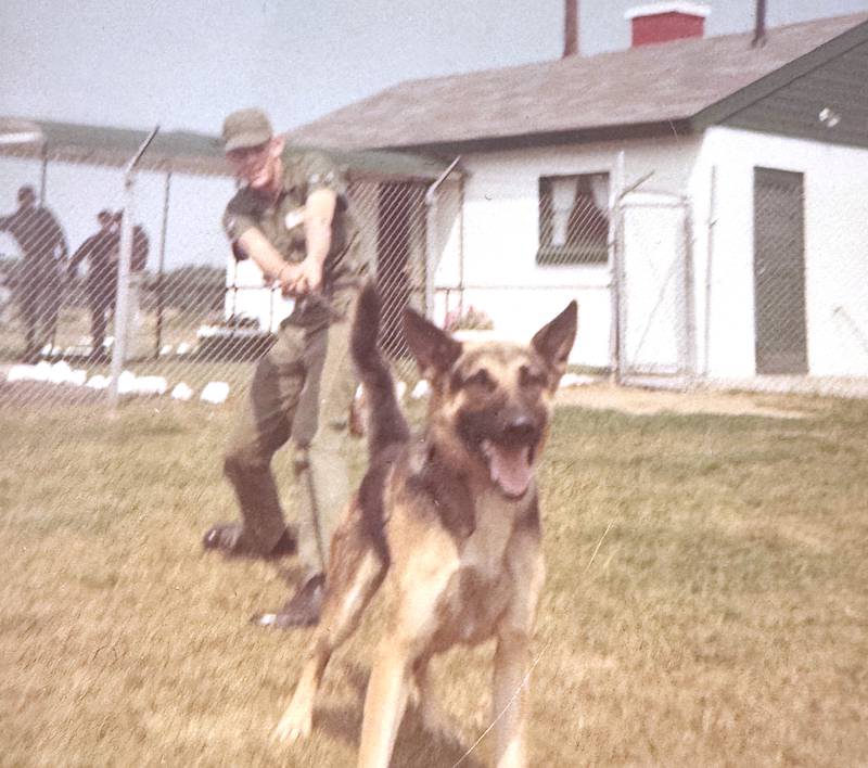 David Homan with one of his dogs while serving as a dog handler in the Vietnam War.