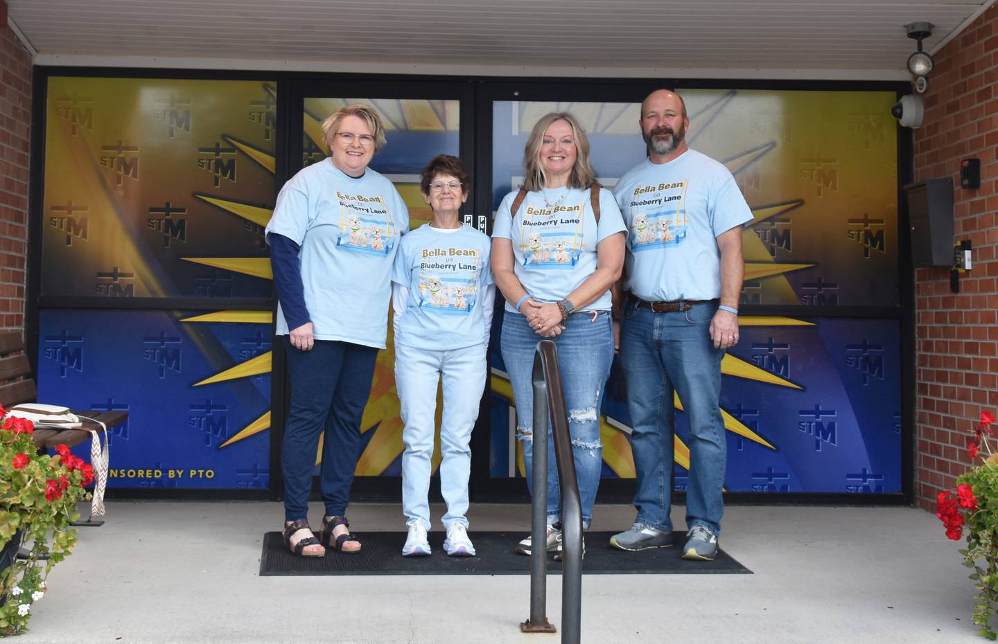 The "Bella Bean" team outside St. Malachy after the donation