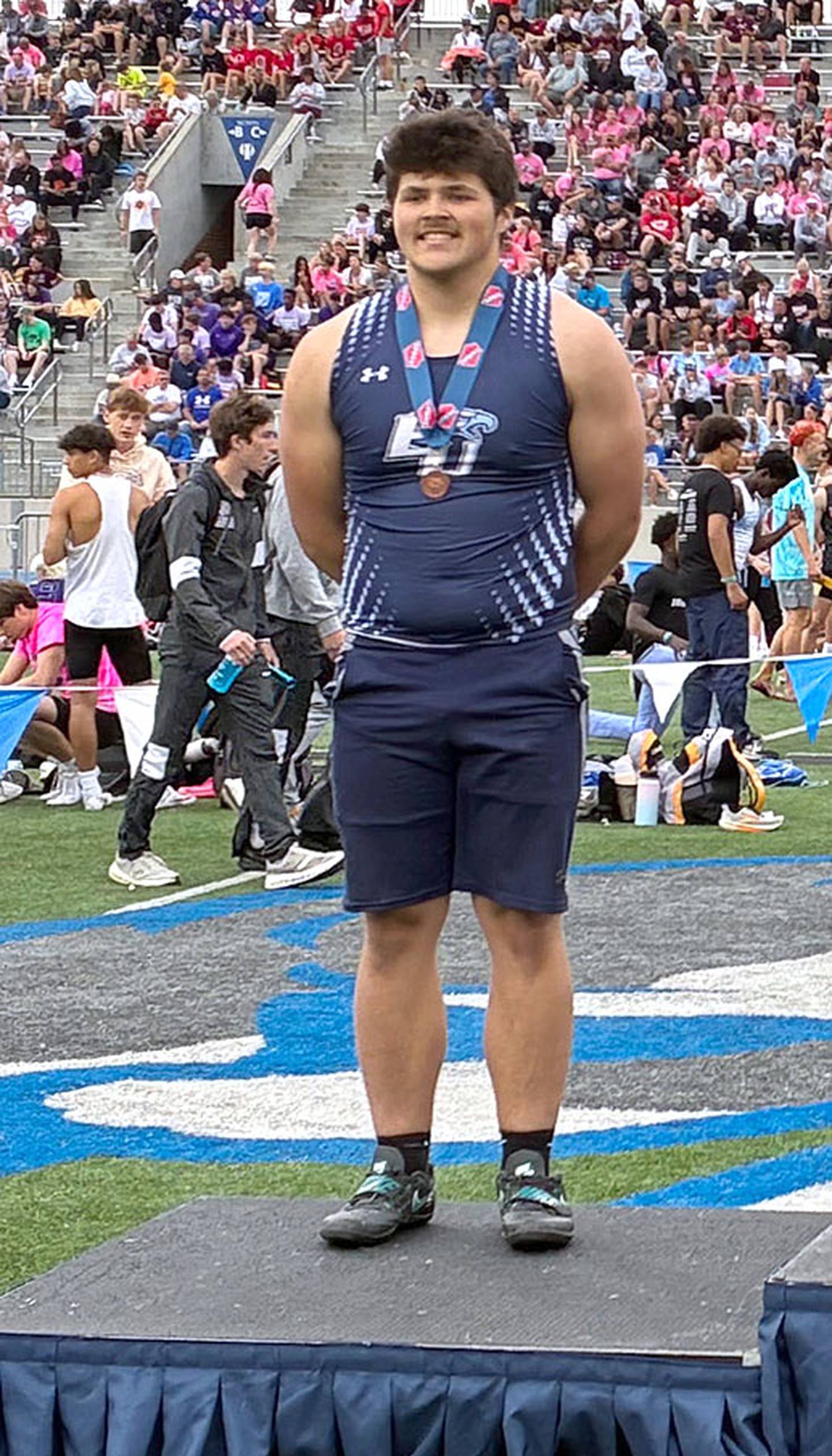 Morgan Cooley of East Union is introduced as the third-place finisher in the Class 1A boys discus with a throw of 157-01.