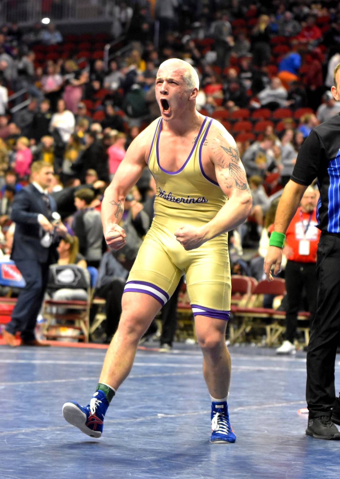 Ashton Honnold of Nodaway Valley celebrates winning the Class 1A 215-pound title.