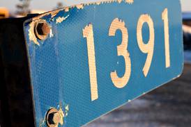 County to address 911 signs