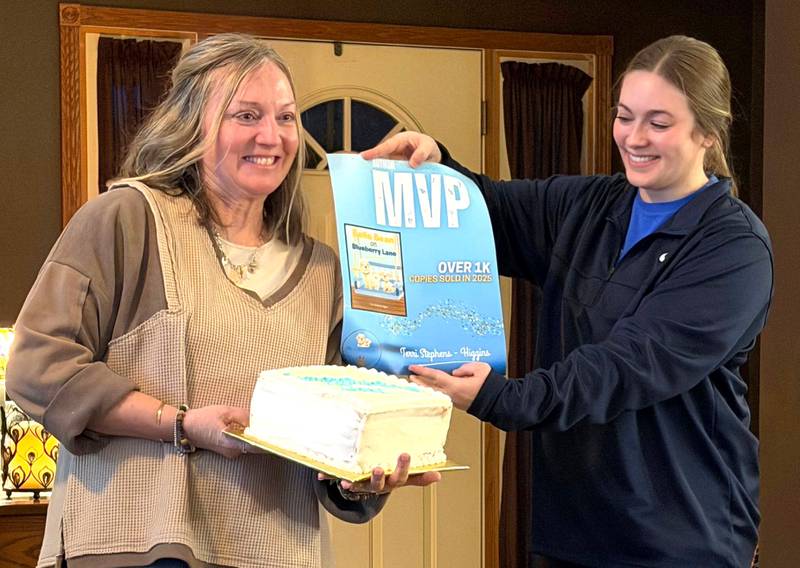 Stephens-Higgins celebrates more than 1,000 books sold in 2025.