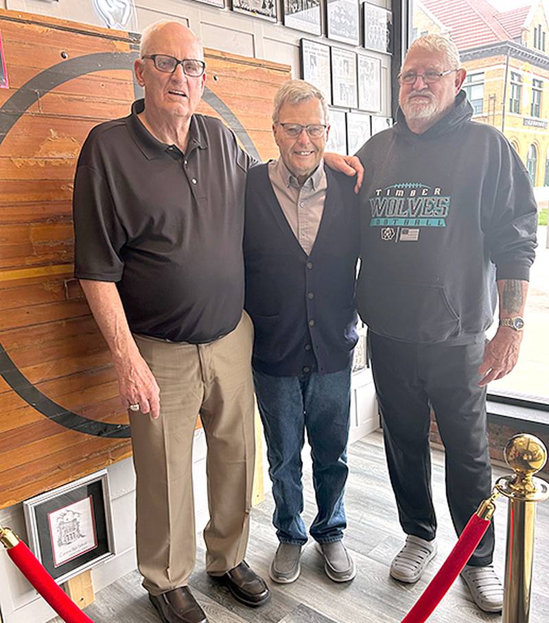 Former Creston teammates from a 21-2 Hawkeye Eight championship team in 1961 attending Saturday's ceremony were, from left, all-state player Larry Goodrich, Jack Davis and Joe Wilson.