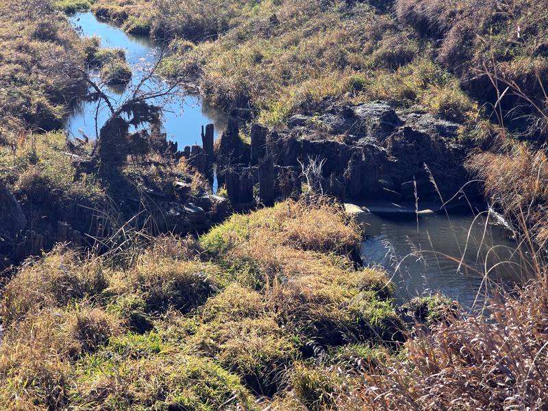 Remnants of an old railroad bridge and pieces of train track sit along Turkey Creek, just south of White Pole Road west of Adair. They are believed to date to the 1870s, when the James gang carried out the first robbery of a moving train west of the Mississippi River.