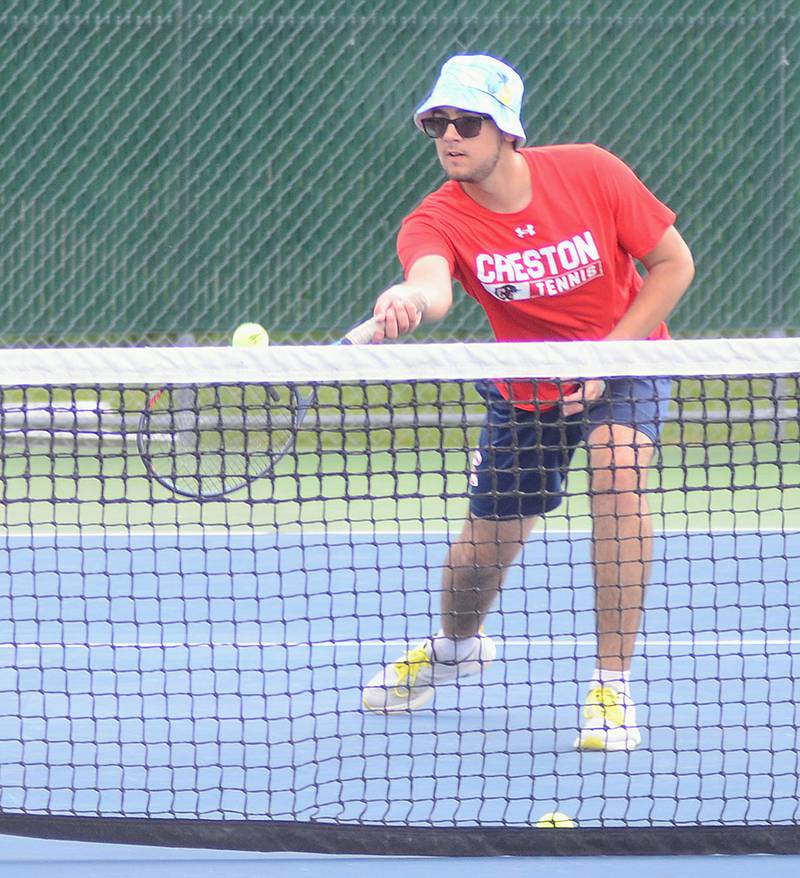 Wesley Wires returns a volley during a match last week against Clarke. The Panther senior placed fourth in No. 2 singles Tuesday at the Hawkeye Ten tournament.
