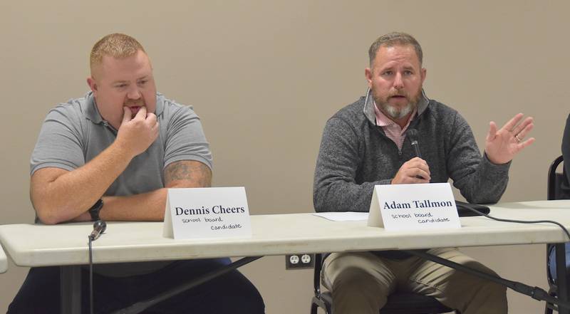 Dennis Cheers listens while incumbent Adam Tallmon speaks during the Afton candidate forum. Both are running for East Union school board's District 1 seat.