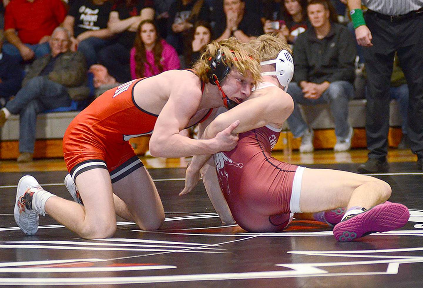 Creston 132-pounder Lincoln Keeler controls Hayden Roush of Shenandoah during his 7-5 victory. It was Keeler's 100th career victory.