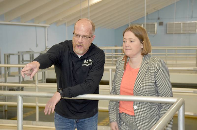 Creston Waterworks General Manager Steve Guthrie explains the water treatment process to Iowa Attorney General Brenna Bird during a tour of the plant earlier this year. Creston Waterworks is continuing to find a problem in the system which limits the amount of water produced.