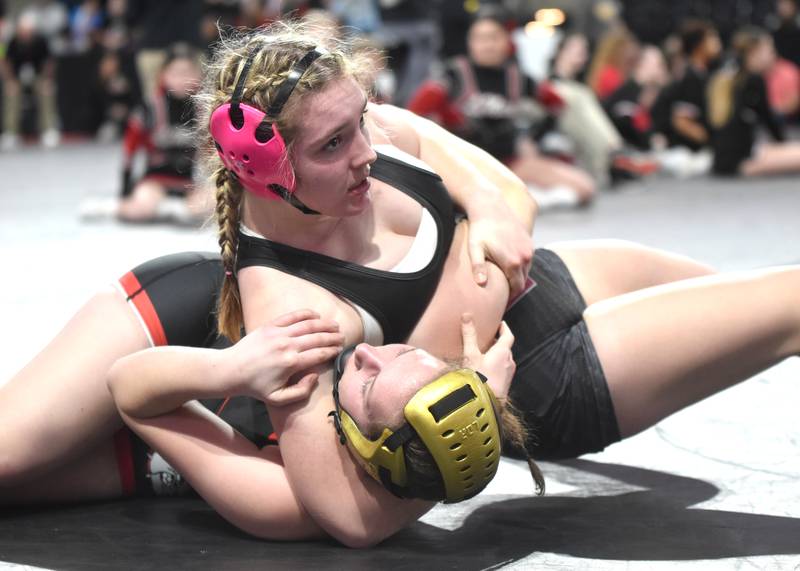 Grace Britten, who goes to Nodaway Valley and wrestles for SWAT girls wrestling, finishes off a pin of Fairfield’s Samantha Lyons in the second period of a match at the IGHSAU state tournament at Xtreme Arena in Coralville.