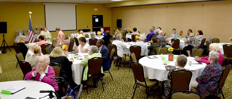 Those attending the Iowa Retired School Personnel Association annual meeting and conference Wednesday in Creston have a social time.